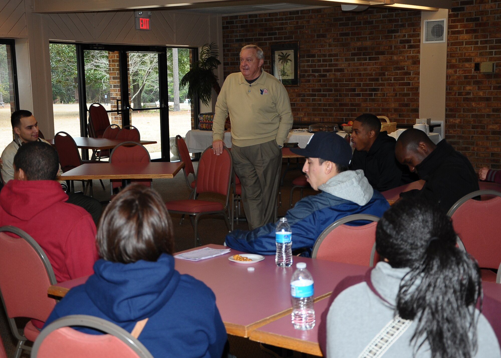 Chief Master Sgt. James Binnicker, the president and CEO of the Air Force Enlisted Village since March 2000, talks to the group of Columbus AFB volunteers about the AFEV and what it means to the Air Force widows that live there Jan. 25 at the AFEV Community Center. Binnicker was the ninth chief master sergeant of the Air Force. He said that his experience as a First Sergeant during his career helped prepare him for his current job. (U.S. Air Force Photo/Airman 1st Class Daniel Lile)