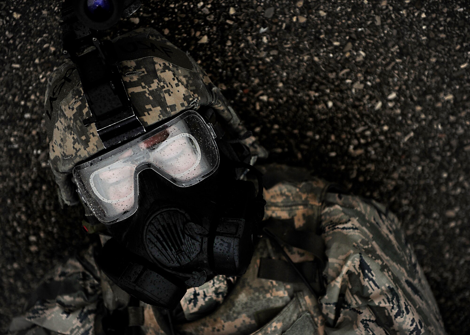 A 31st Security Forces Squadron Airman, waits for help during a wing inspection, Feb. 4, 2014, at Aviano Air Base, Italy. Emergency responders participated in simulated scenarios during a week-long inspection, which tested the wing’s ability to respond to emergency situations.  (U.S. Air Force photo/Staff Sgt. Evelyn Chavez)