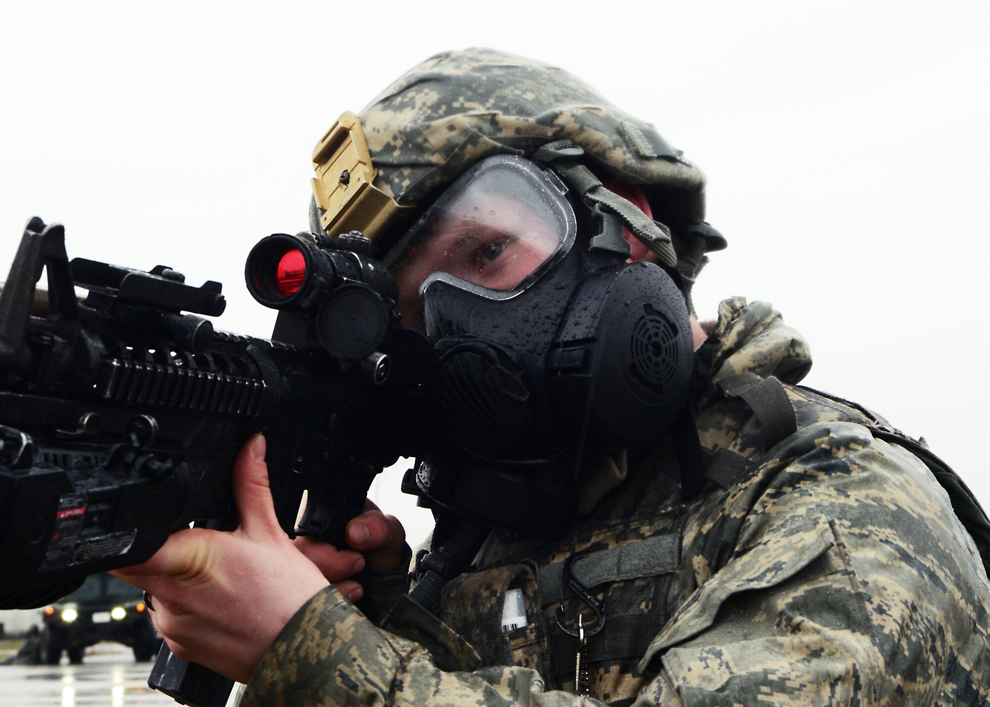 Airman 1st Class Codey Hintermeister, 31st Security Forces Squadron member, defends a post during a wing inspection, Feb. 4, 2014, at Aviano Air Base, Italy. Emergency responders participated in several simulated scenarios during a week-long inspection, which tested the wing’s ability to respond to emergency situations.  (U.S. Air Force photo/Airman 1st Class Ryan Conroy)