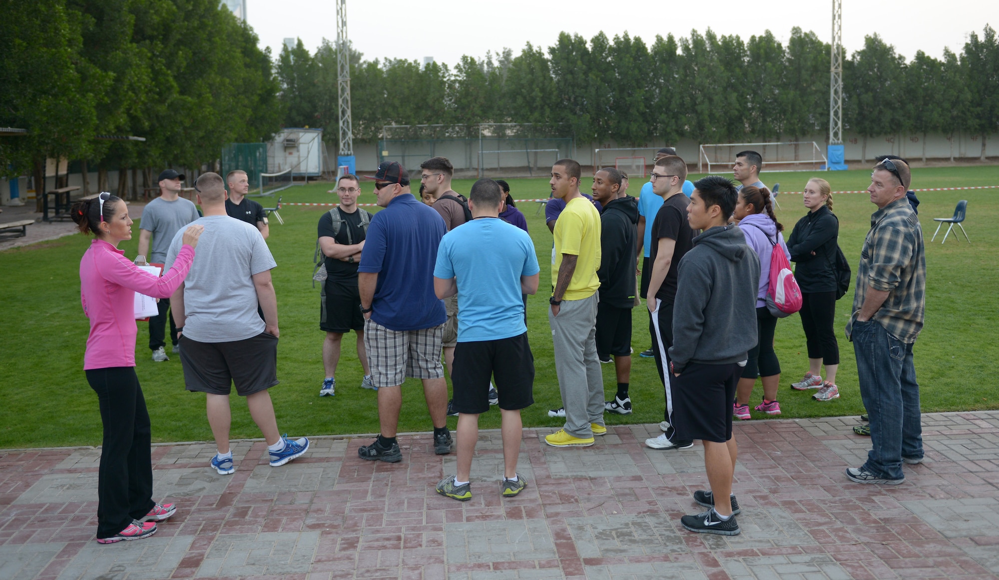 A total of 57 Airmen and Soldiers volunteer to spend the day with 977 students from the American School of Doha in Qatar, during Sports Day, Feb. 2, 2014. Established in 2011, the Qatar National Sports Day prompted a government mandate that all schools develop a “sports day” the week prior to the national holiday to create awareness about sports and its health benefits in an effort to meet the challenges of a rapidly increasing youthful population. This year Qatar National Sports Day takes place Feb. 11. (U.S. Air Force photo/Senior Airman Hannah Landeros) 