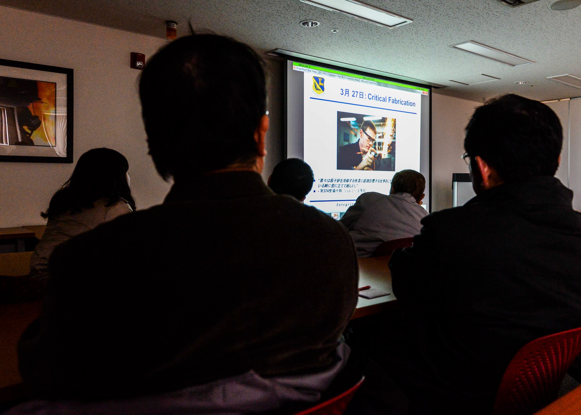 Members of the Japan Society for Security and Crisis Management receive a briefing on Yokota’s participation during Operation Tomodachi at Yokota Air Base, Japan, Feb. 4, 2014.  The purpose of their visit on Yokota was to gain better understanding of current security assurance between U.S. and Japan, as well as Yokota’s crisis management system.  (U.S. Air Force photo by Air Force photo by Airman 1st Class Soo C. Kim / released)