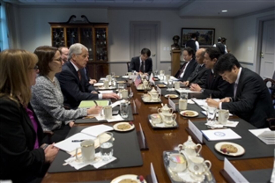 U.S. Defense Secretary Chuck Hagel meets with Japanese Foreign Minister Fumio Kishida at the Pentagon, Feb. 7, 2014. Hagel and Kishida met to discuss issues of mutual importance.