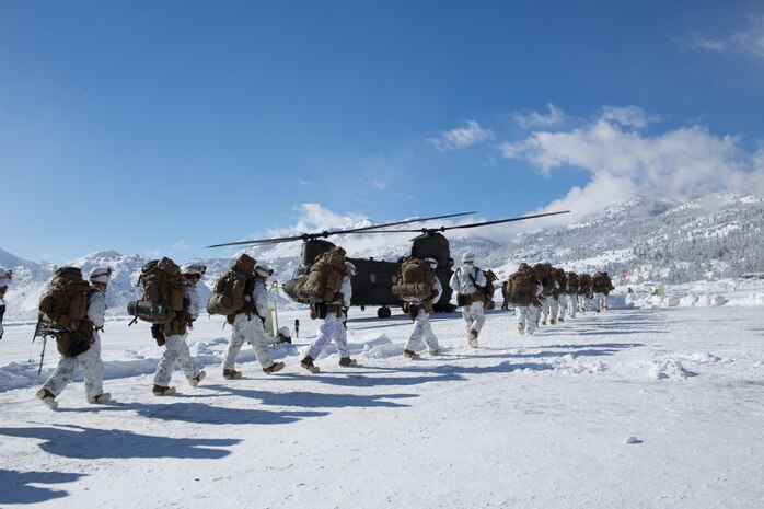Marines from Golf Company, 2nd Battalion, 2nd Marine Regiment, 2nd Marine Division load a waiting CH-47 helicopter, which will insert them at a high elevation landing zone for the final field exercise for Mountain Exercise winter training package at MCMWTC Bridgeport, Calif. , Jan. 31, 2014. The Warlords and its attached units underwent the winter training package at MCMWTC to prepare for the upcoming a multi-lateral joint and combined exercise Cold Response, which will take place in March of 2014 in Norway.