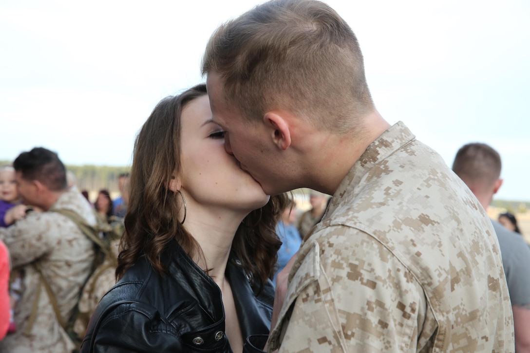 Lance Cpl. Cody Ryan shares a moment with his fiancée, Mary Kate Sheehan, after returning from a seven-month deployment to Afghanistan Feb. 2. Ryan greeted Sheehan by getting on one knee and proposing. Sheehan accepted. Ryan is a safety and survival mechanic with Marine Aerial Refueler Transport Squadron 252 aboard Marine Corps Air Station Cherry Point.


