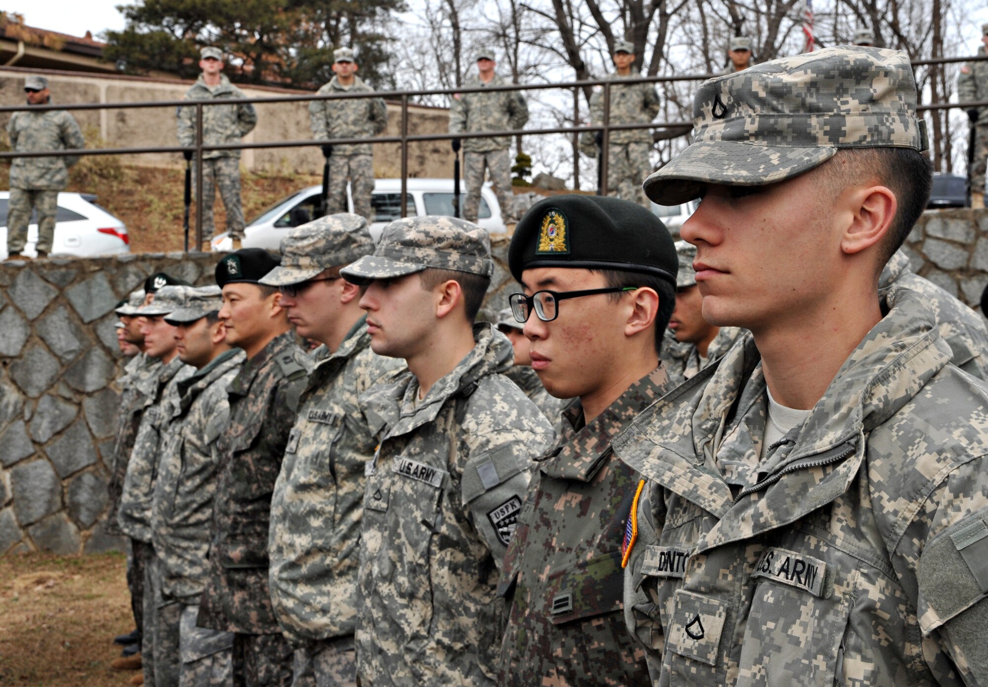 Members of the U.S. and Republic of Korea military man the formation at the Hill 180 remembrance ceremony at Osan Air Base, ROK, Feb. 7, 2014. This year marked the 63rd Anniversary of the Battle of Hill 180, also known as the Battle of Bayonet Hill, that pitted 14 U.S. Army Soldiers of the 27th Infantry Easy Company against Chinese forces during the Korean War. (U.S. Air Force photo/Airman 1st Class Ashley J. Thum)