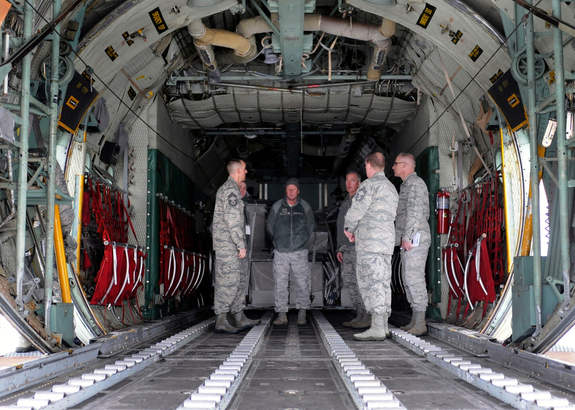 Air Force reservists in the wing’s 67th Aerial Port Squadron give Maj. Gen. Richard Shook a tour of the squadron as part of a 419th tour here today. (U.S. Air Force photo/Senior Airman Allen Stokes) 
