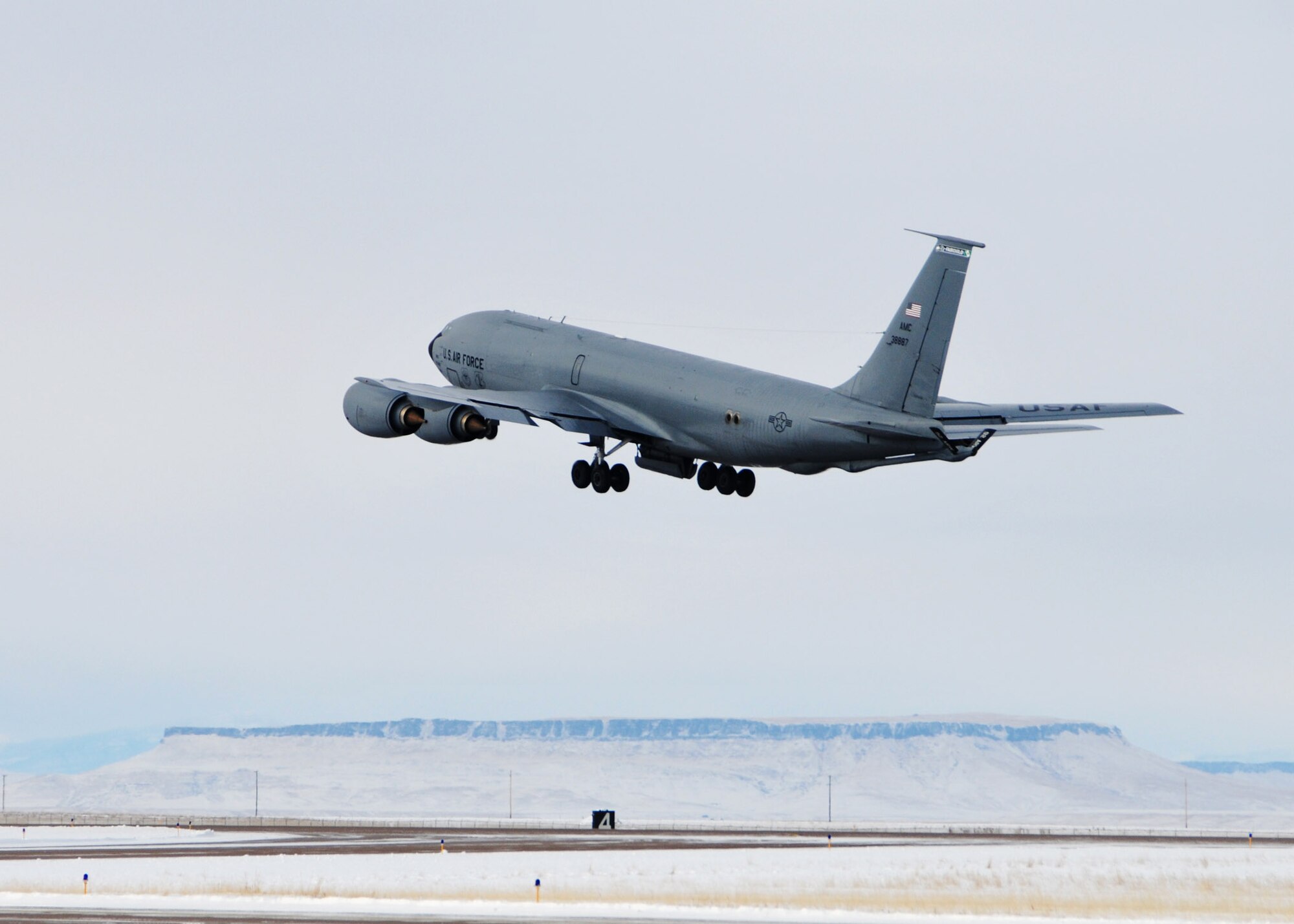 A KC-135 Stratotanker assigned to the 92nd Air Refueling Wing and the 141st Air Refueling Wing from Fairchild Air Force Base, Wash. takes off from the Great Falls International Airport runway. The aircraft was taking members of the 120th Civil Engineer Squadron, 219th RED HORSE Squadron and the 341st Civil Engineer Squadron to Tyndall Air Force Base, Fla. to participate in the Silver Flag exercise. National Guard photo/Senior Master Sgt. Eric Peterson.