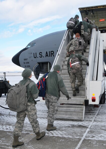 Members of the 120th Civil Engineer Squadron, 219th RED HORSE Squadron and the 341st Civil Engineer Squadron board a KC-135 Stratotanker assigned to the 92nd Air Refueling Wing and the 141st Air Refueling Wing from Fairchild Air Force Base, Wash. The Airmen were deploying to Tyndall Air Force Base, Fla. to participate in the Silver Flag exercise. National Guard photo/Senior Master Sgt. Eric Peterson.
