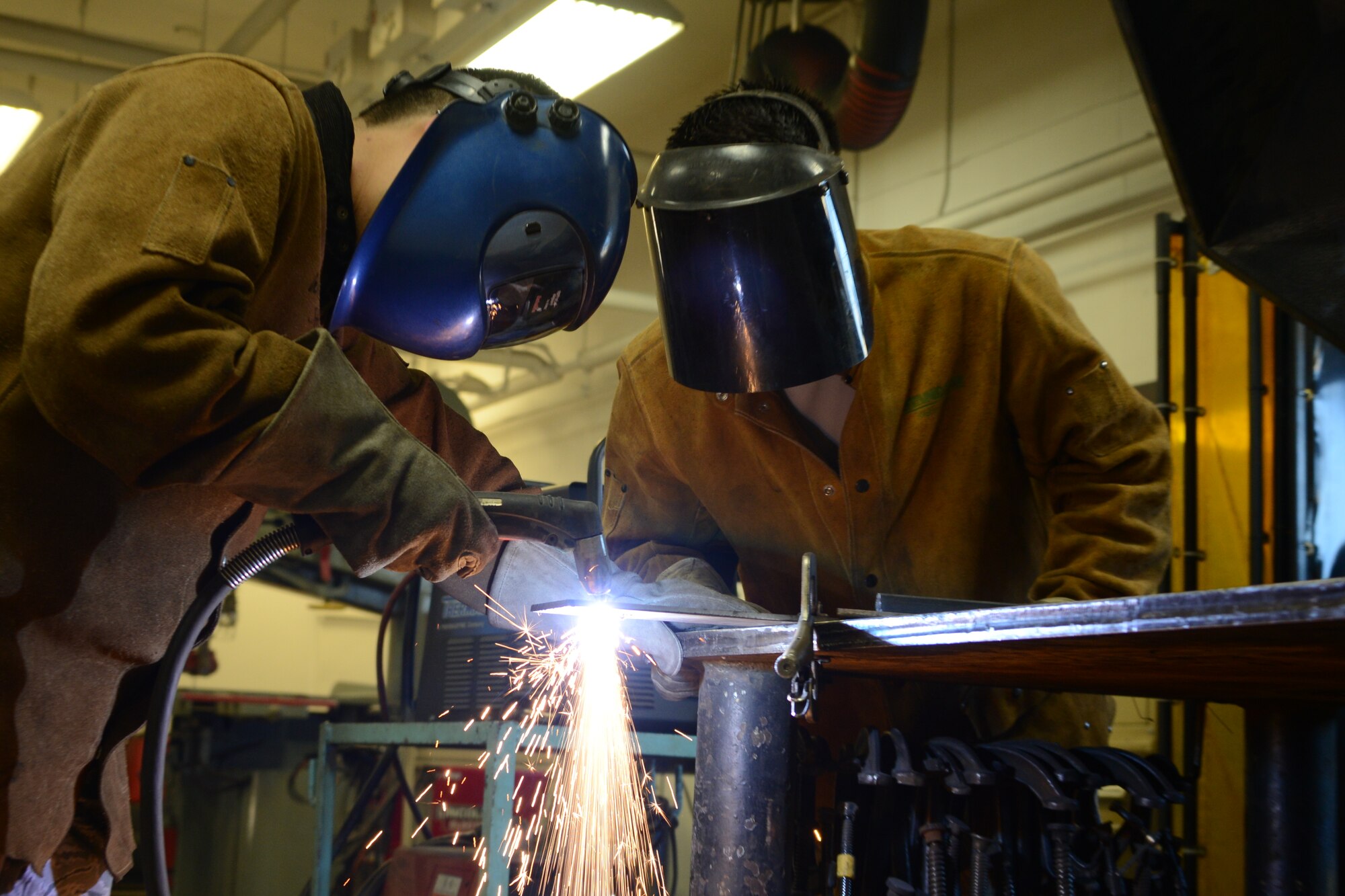 Members of the 477th Civil Engineer Structural shop conduct plasma cutting training during the 477th Fighter Group Reserve Unit Training Assembly Feb. 9. The UTA provides an opportunity for all the Reservists assigned to the 477th Fighter Group to come together and train one weekend a month. (U.S. Air Force/Tech. Sgt. Dana Rosso)