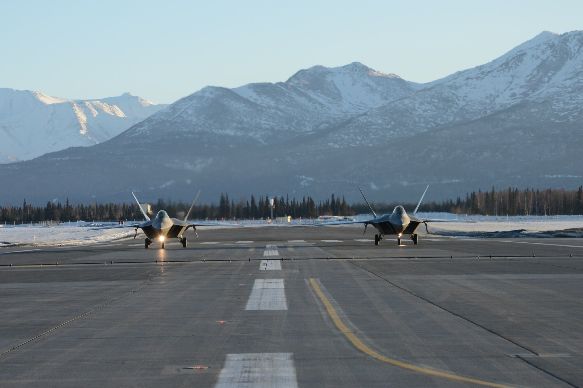Two F-22’s prepare to take-off during the Reserve Unit Training Assembly weekend here Feb. 8. The pilots assigned to the 302nd Fighter Squadron integrate with their active duty counterparts in the 3rd Wing during the week but take advantage of the Reserve weekends once a month to train as a Reserve unit. (U.S. Air Force/Tech. Sgt. Dana Rosso) 