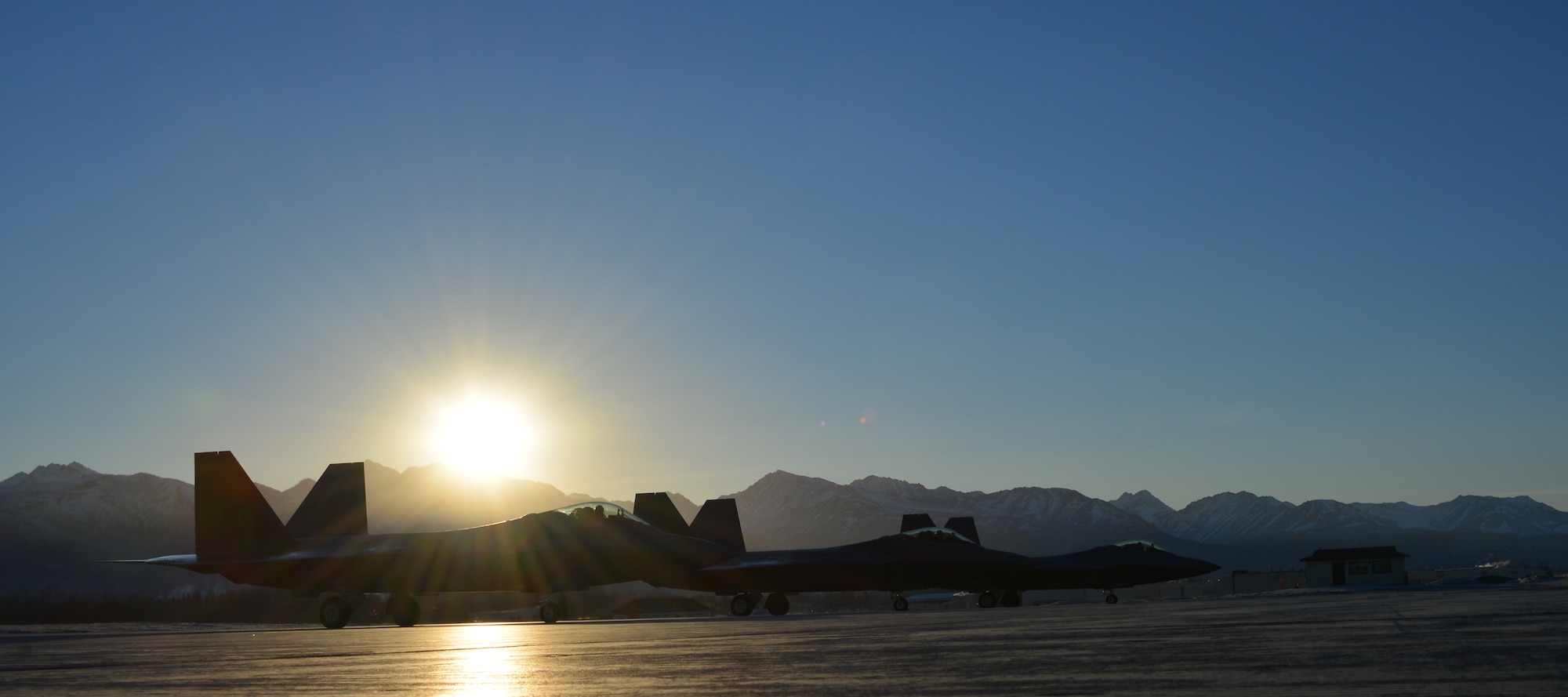 Three F-22’s prepare to take-off during the 477th Fighter Groups' Unit Training Assembly weekend here Feb. 8. The pilots assigned to the 302nd Fighter Squadron integrate with their active duty counterparts in the 3rd Wing during the week but take advantage of the Reserve weekends once a month to train as a Reserve unit. (U.S. Air Force/Capt. Ashley Conner) 