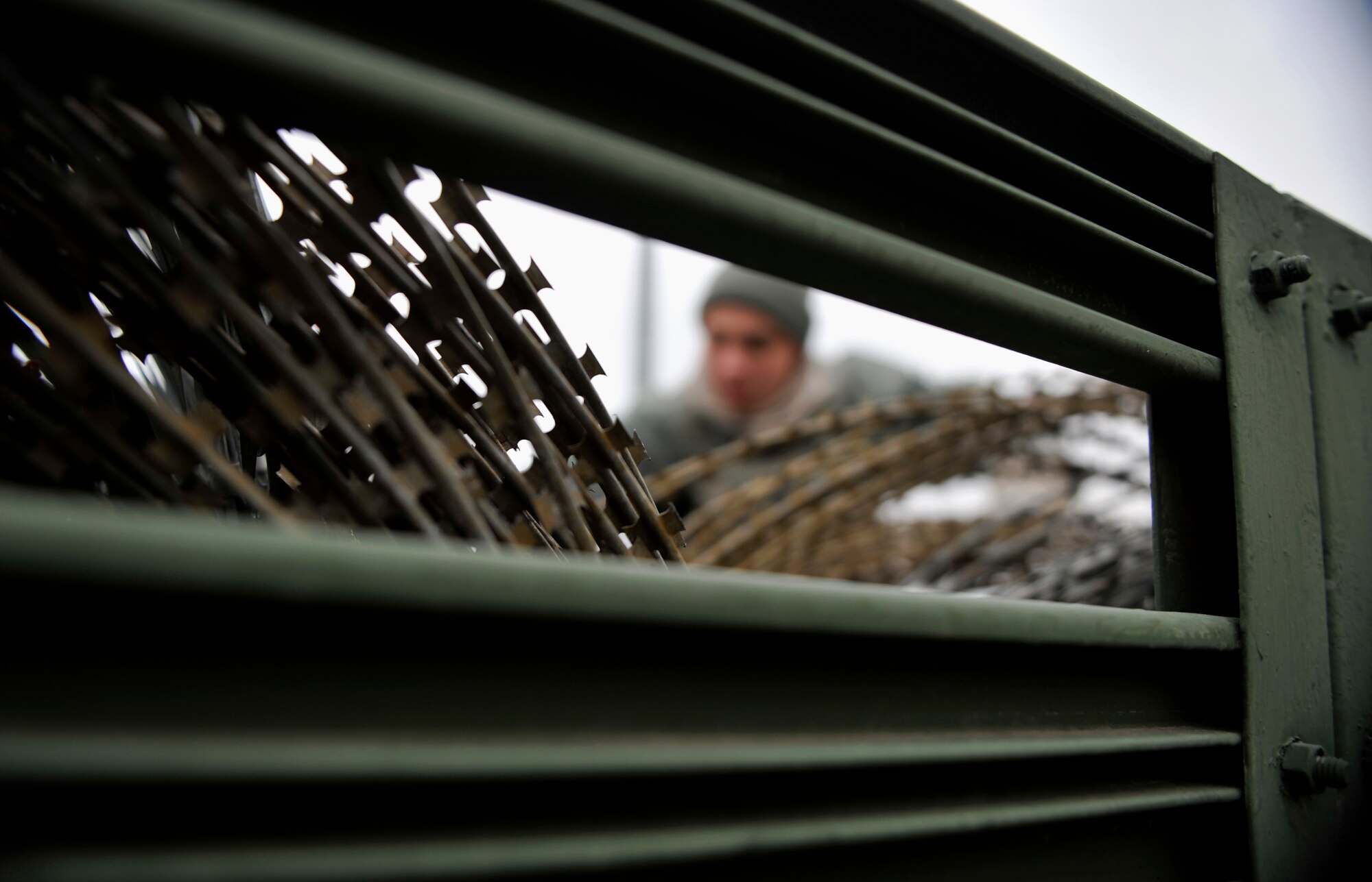Concertina wire sits in the bed of a truck, waiting to be used as a barrier during Operational Readiness Exercise Beverly Midnight 14-02 at Osan Air Base, Republic of Korea, Feb. 9, 2014. During exercises and war-time contingency operations, c-wire is placed strategically around the base. (U.S. Air Force photo/Senior Airman Siuta B. Ika)
