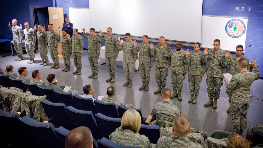 Newly promoted Staff Sgts. recite the Noncommissioned Officer Creed during a NCO Recognition ceremony. Recent Staff Sgt. and Master Sgt. promotees were recognized during the February Unit Training Assembly at the Minneapolis-St. Paul Air Reserve Station, Minn. (U.S. Air Force photo by Shannon McKay/Released)