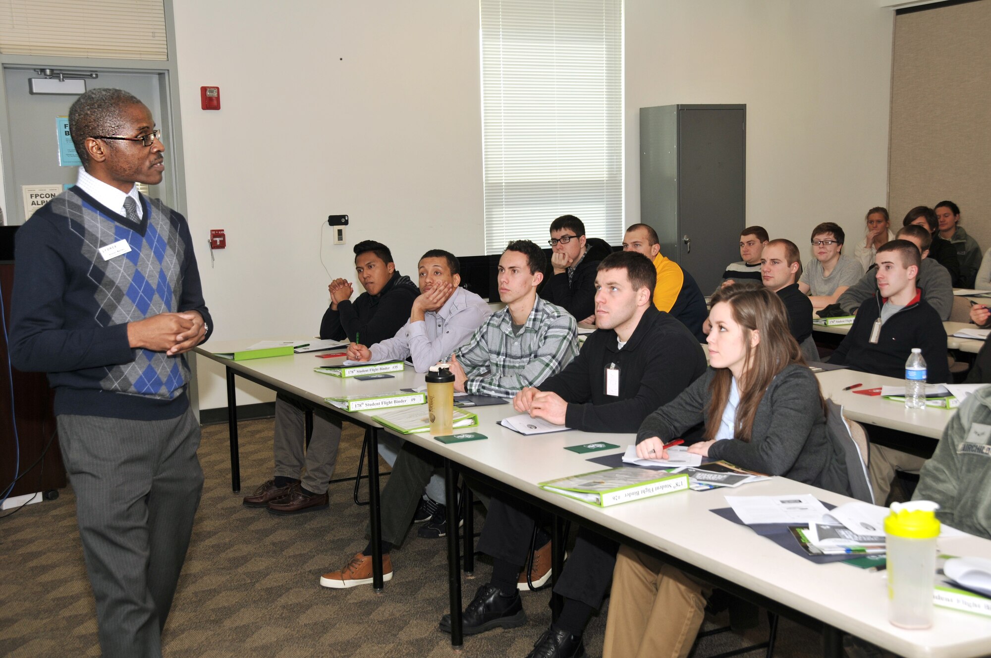 Victor Bailey, a community readiness consultant from Wright-Patterson AFB Family Readiness Center, teaches a credit management seminar Feb. 7, 2014 at Springfield Air National Guard Base, Ohio.  Bailey spoke to new recruits in the 178th Student Flight on the subject of understanding thier credit report as part of the Military Saves workshop. (U.S. Air National Guard Photo by Master Sgt. Seth Skidmore)