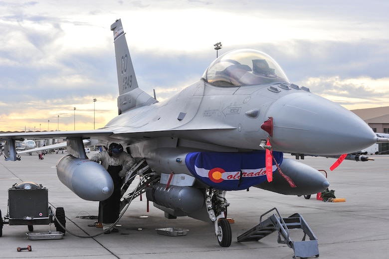 U.S. Air Force Senior Airman Scott Sullivan, 140th Maintenance Squadron, Colorado Air National Guard, adds liquid oxygen to an F-16 Falcon fighter jet from the 120th Fighter Squadron at Buckley Air Force Base, Colo. after a training mission during Red Flag 14-1, at Nellis Air Force Base, Nev., Jan. 29, 2014. Combat units come together from the United States and its allied countries to engage in realistic combat training scenarios within Nellis’ 2.9 million acre Test and Training Range Complex. (U.S. Air National Guard photo/Tech. Sgt. Wolfram M. Stumpf)