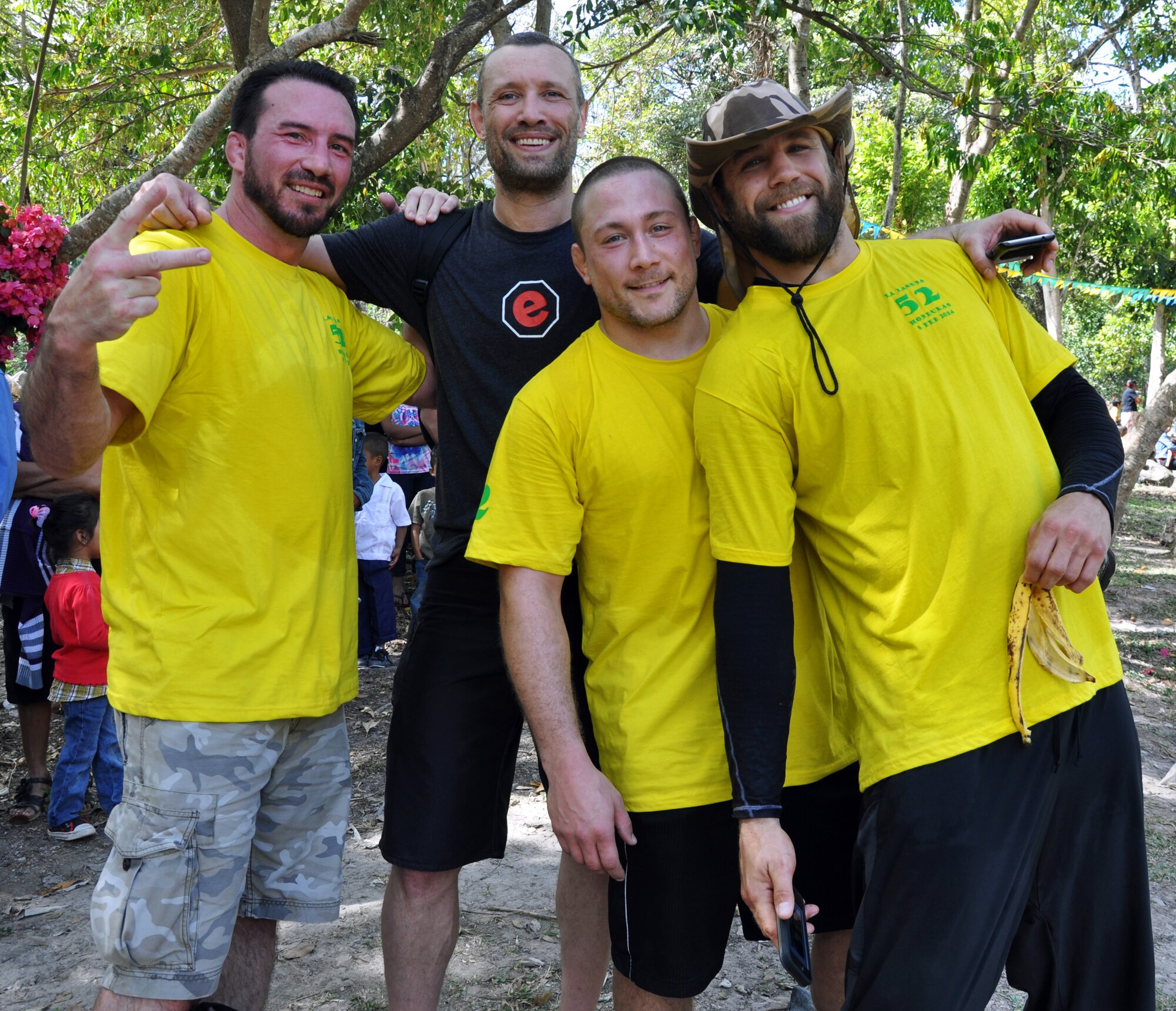 Ultimate Fighting Championship (UFC) professional fighters Kyle Kingsbury, Mike Pierce, Nate "Rock" Quarry and Steven Josephy pose for a photo during the 52nd Joint Task Force-Bravo "Chapel Hike" in Honduras, Feb. 8, 2014. More than 120 members of Joint Task Force-Bravo spent the day delivering more than 2,400 pounds of food and medical supplies to families in need in the mountain village of La Laguna, Honduras. To deliver the supplies, Task Force members carried the items on a more than seven-mile round trip hike, with an elevation gain of 1,700 feet. All of the food and supplies were purchased with funds donated by Task Force members.  The four professional fighters were visiting Soto Cano to provide a mixed martial arts demonstration for Task Force members and joined Joint Task Force-Bravo on the Chapel Hike.  (U.S. Air Force photo by Capt. Zach Anderson)