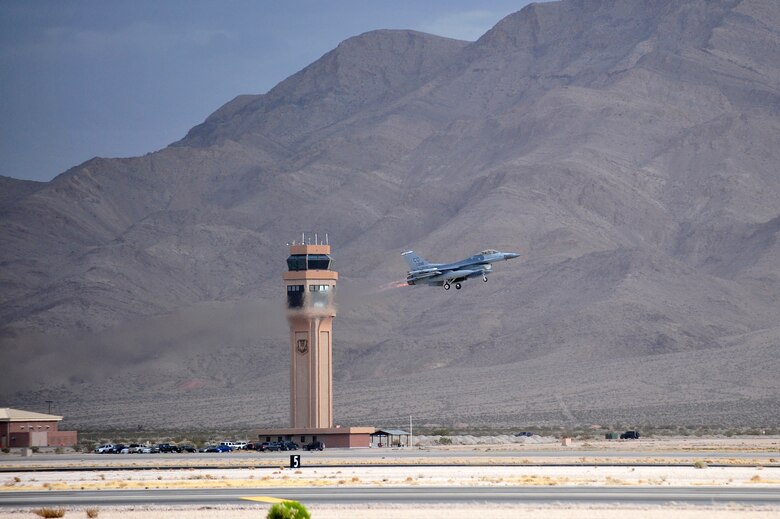 An F-16 Fighting Falcon takes off for a training mission during Red Flag 14-1, at Nellis Air Force Base, Nev., Jan. 30, 2014. Combat units come together from the United States and its allied countries to engage in realistic combat training scenarios within Nellis’ 2.9 million acre Test and Training Range Complex. The F-16 is assigned to the 120th Fighter Squadron at Buckley Air Force Base, Colorado Air National Guard.  (U.S. Air National Guard photo by Tech. Sgt. Wolfram M. Stumpf)