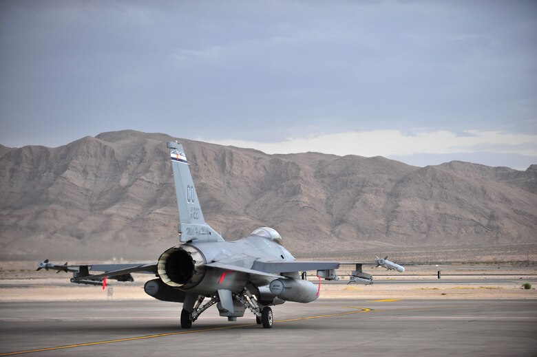 An F-16 Fighting Falcon from the 120th Fighter Squadron at Buckley Air Force Base, Colorado Air National Guard, taxis for a training mission during Red Flag 14-1, at Nellis Air Force Base, Nev., Jan. 30, 2014. Combat units come together from the United States and its allied countries to engage in realistic combat training scenarios within Nellis’ 2.9 million acre Test and Training Range Complex. (U.S. Air National Guard photo/Tech. Sgt. Wolfram M. Stumpf)