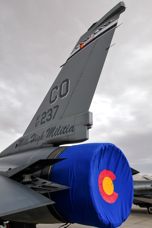 An F-16 Fighting Falcon from the 120th Fighter Squadron at Buckley Air Force Base, Colorado Air National Guard, is covered up while awaiting its next mission during Red Flag 14-1, at Nellis Air Force Base, Nev., Jan. 30, 2014. Combat units come together from the United States and its allied countries to engage in realistic combat training scenarios within Nellis’ 2.9 million acre Test and Training Range Complex. (U.S. Air National Guard photo/Tech. Sgt. Wolfram M. Stumpf)