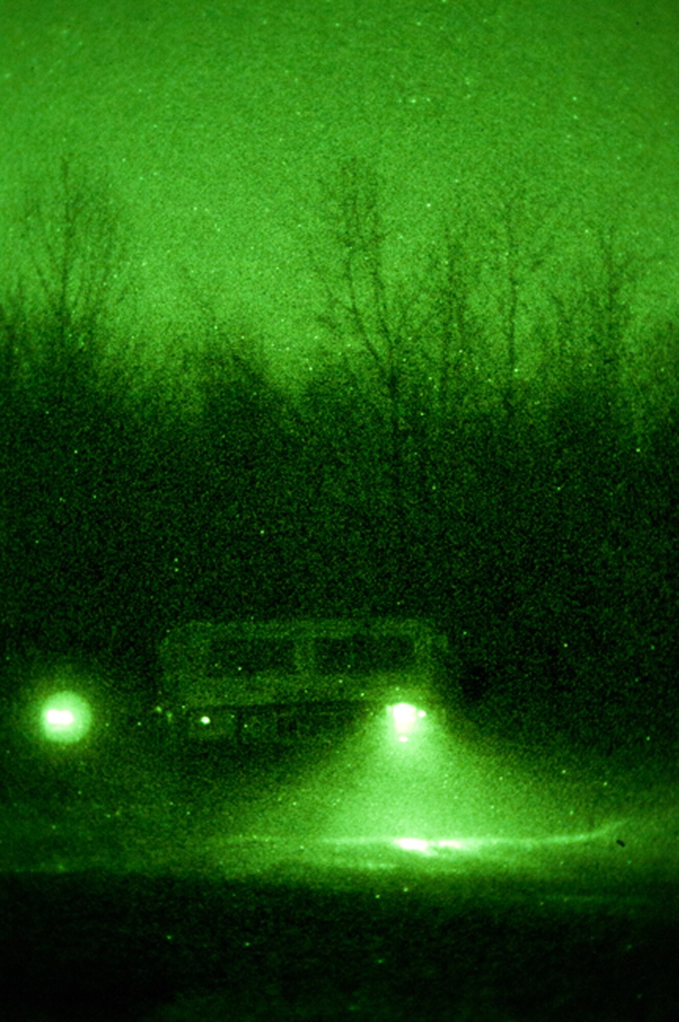 The 108th Contingency Response Group conducts training Jan. 11, 2014 with new members of the CRG at Joint Base McGuire-Dix-Lakehurst, N.J. The CRG members drove in High Mobility Multipurpose Wheeled Vehicles with night vision goggles during the evening hours at DTA3 on the Fort Dix side of the base. (U.S. Air National Guard photo by Senior Airman Kellyann Novak / Released)