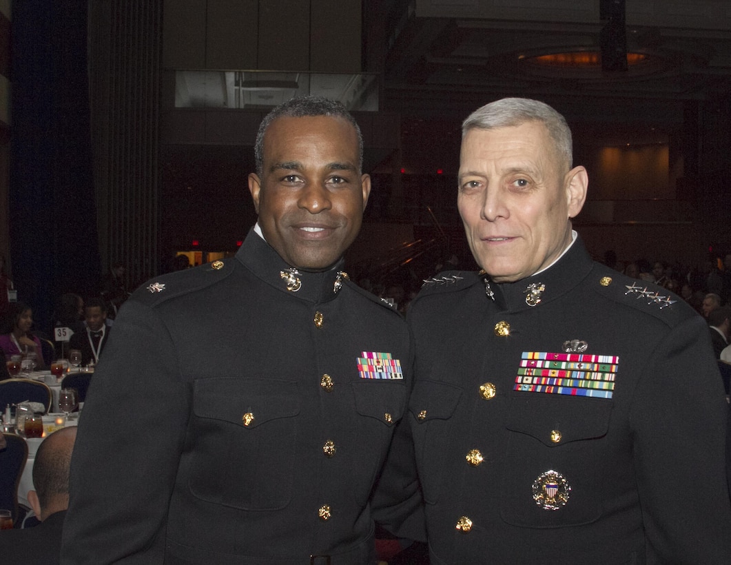 WASHINGTON, DC – General John M. Paxton Jr., Assistant Commandant of the Marine Corps, poses with Lt. Col. David Rodgers, reserve support officer, Marine Corps Recruiting Command (MCRC), at the 9th annual Stars and Stripes Dinner during the Black Engineer of the Year Awards (BEYA) conference here, Feb. 7. The dinner is held at BEYA to promote Science, Technology, Engineering and Mathematics (STEM) by providing STEM leaders the opportunity to mentor youth in STEM and highlighting the contributions of black Americans in support of the nation and its military.