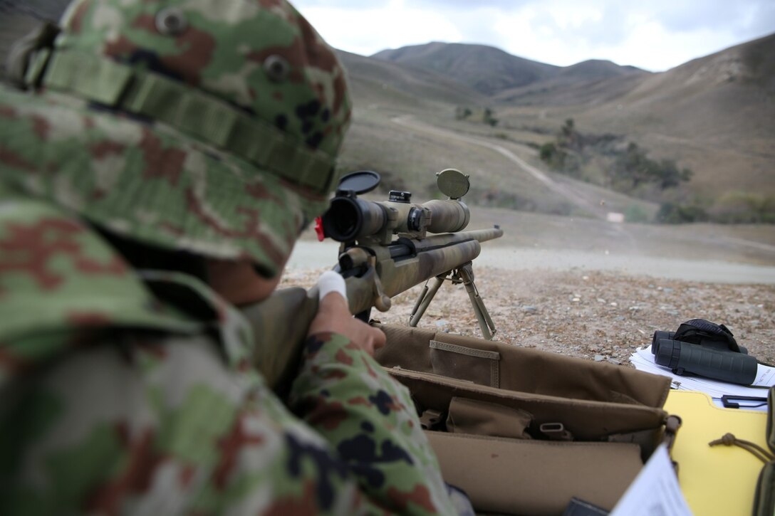 A soldier from the Japan Ground Self-Defense Force shoots an M24 rifle while conducting unknown distance drills during Exercise Iron Fist 2014 aboard Camp Pendleton, Calif., Feb. 6, 2014. Iron Fist is an amphibious exercise that brings together Marines and sailors from the 15th Marine Expeditionary Unit, other I Marine Expeditionary Force units, and soldiers from the JGSDF, to promote military interoperability and hone individual and small-unit skills through challenging, complex and realistic training. 