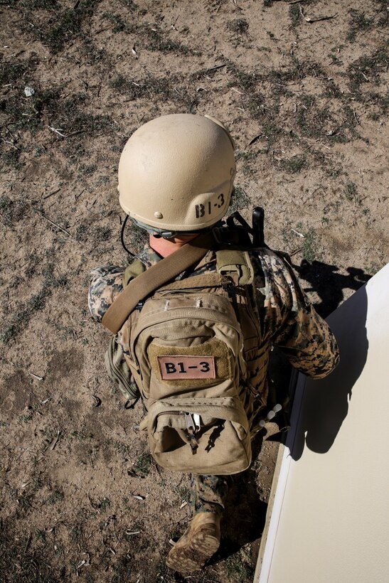 A U.S. Marine with 1st Reconnaissance Battalion, 1st Marine Division, provides security while conducting raid training with soldiers from the Japan Ground Self-Defense Force during Exercise Iron Fist 2014 aboard Camp Pendleton, Calif., Feb. 7, 2014. Iron Fist is an amphibious exercise that brings together Marines and sailors from the 15th Marine Expeditionary Unit, other I Marine Expeditionary Force units, and soldiers from the JGSDF, to promote military interoperability and hone individual and small-unit skills through challenging, complex and realistic training. 