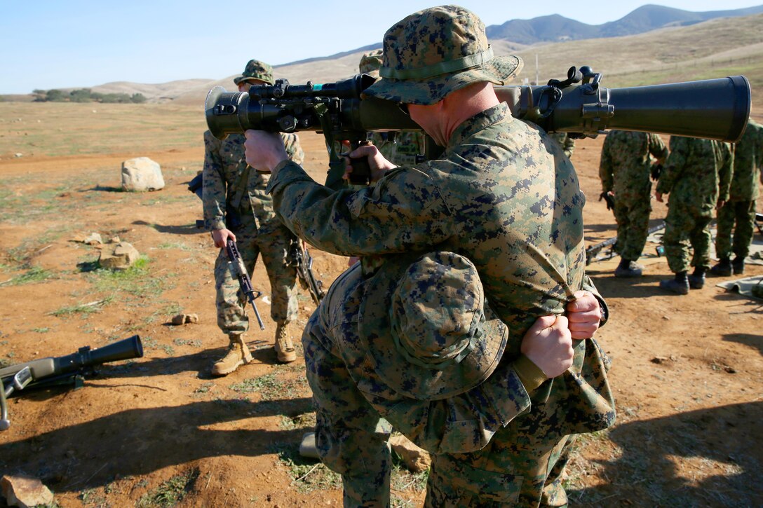 A U.S. Marine with 1st Battalion, 1st Marine Regiment, holds an 84mm Carl Gustav recoilless rifle while training with soldiers from the Japan Ground Self-Defense Force during Exercise Iron Fist 2014 aboard Camp Pendleton, Calif., Feb. 8, 2014. Iron Fist 2014 is an amphibious exercise that brings together Marines and sailors from the 15th Marine Expeditionary Unit, other I Marine Expeditionary Force units, and soldiers from the JGSDF, to promote military interoperability and hone individual and small-unit skills through challenging, complex and realistic training. (U.S. Marine Corps photo by Lance Cpl. Anna K. Albrecht/Released)