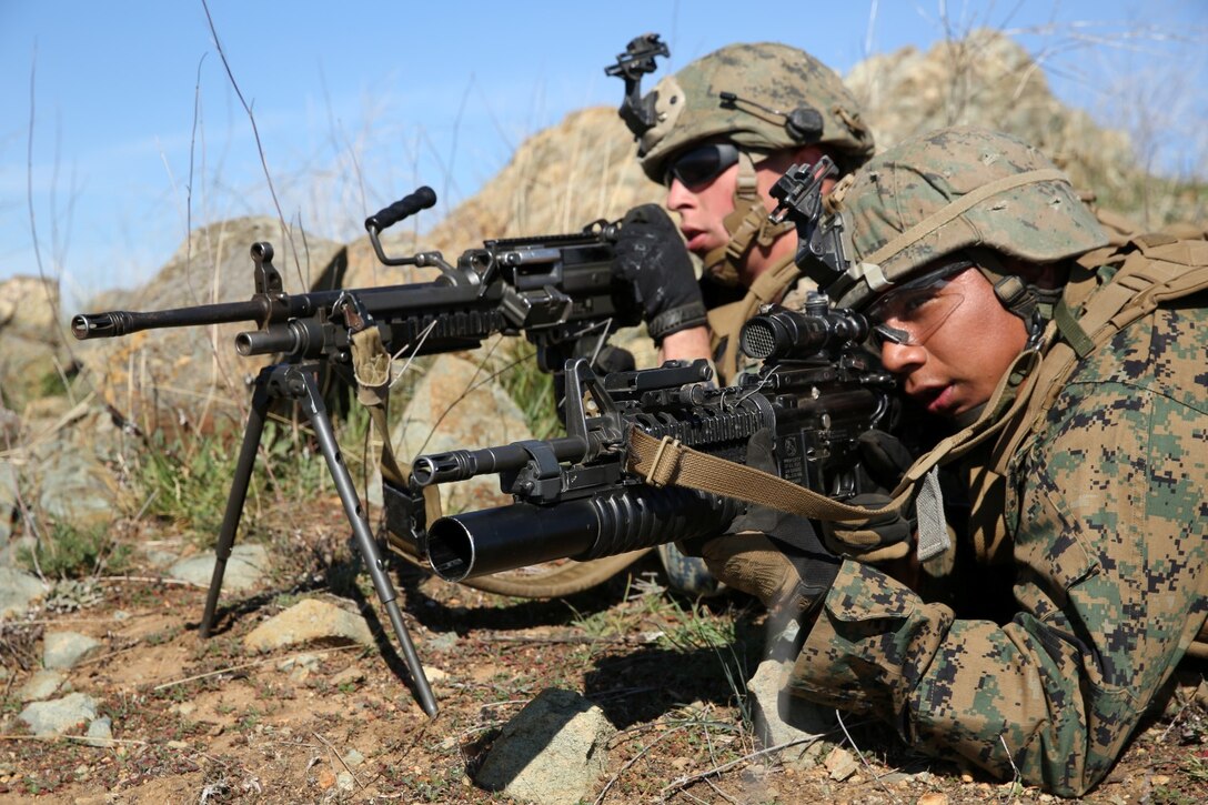 U.S. Marines with 1st Battalion, 1st Marine Regiment, train with soldiers from the Japan Ground Self-Defense Force during Exercise Iron Fist 2014 aboard Camp Pendleton, Calif., Feb. 8, 2014. Iron Fist 2014 is an amphibious exercise that brings together Marines and sailors from the 15th Marine Expeditionary Unit, other I Marine Expeditionary Force units, and soldiers from the JGSDF, to promote military interoperability and hone individual and small-unit skills through challenging, complex and realistic training. (U.S. Marine Corps photo by Lance Cpl. Anna K. Albrecht/Released)