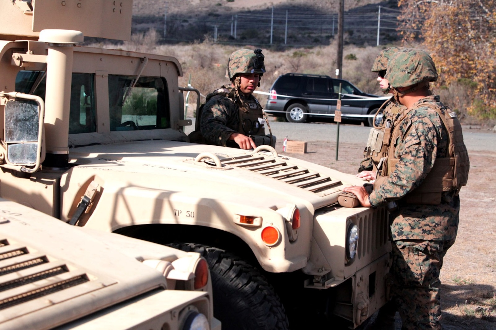 Marines with 1st Law Enforcement Battalion discuss plans during a combat operations center exercise aboard Camp Pendleton, Calif., Feb. 5. The exercise created a realistic environment for Marines to quickly and effectively establishes a center of operations.