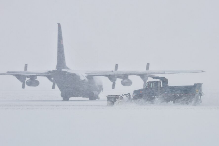 Member from the 374th Civil Engineer Squadron Horizontal “Dirt Boyz” shop have been performing 24 hours Snow Removal Operation since Feb. 7, 1800hrs. 20 personnel from the shop clean Air Field with SnowPlow vehicles. (U.S. Air Force photo by Osakabe Yasuo/Released)