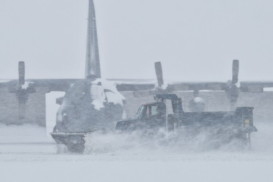 Member from the 374th Civil Engineer Squadron Horizontal “Dirt Boyz” shop have been performing 24 hours Snow Removal Operation since Feb. 7, 1800hrs. 20 personnel from the shop clean Air Field with SnowPlow vehicles. (U.S. Air Force photo by Osakabe Yasuo/Released)