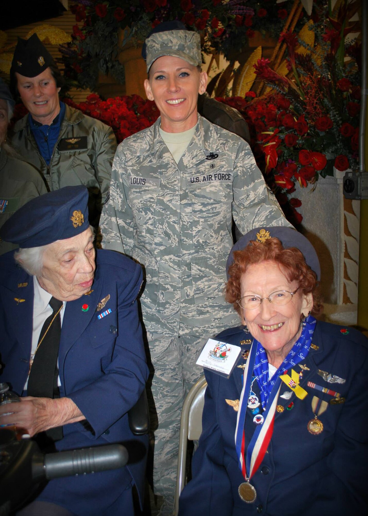 Senior Master Sgt. Gina Louis, production supervisor with the 315th Aircraft Maintenance Squadron at Joint Base Charleston, S.C., pauses for a photo with Women Airforce Service Pilots Jean Terrell McCreery (left) and Betty Liz Stroffus (right). Louis has volunteered with the WASP organization for the past seven years, and she recently accompanied the group to the Rose Bowl Parade in Pasadena, Calif. on New Year’s Day. The WASP flew non-combat missions for the military during World War II. (courtesy photo/Senior Master Sgt. Gina Louis)