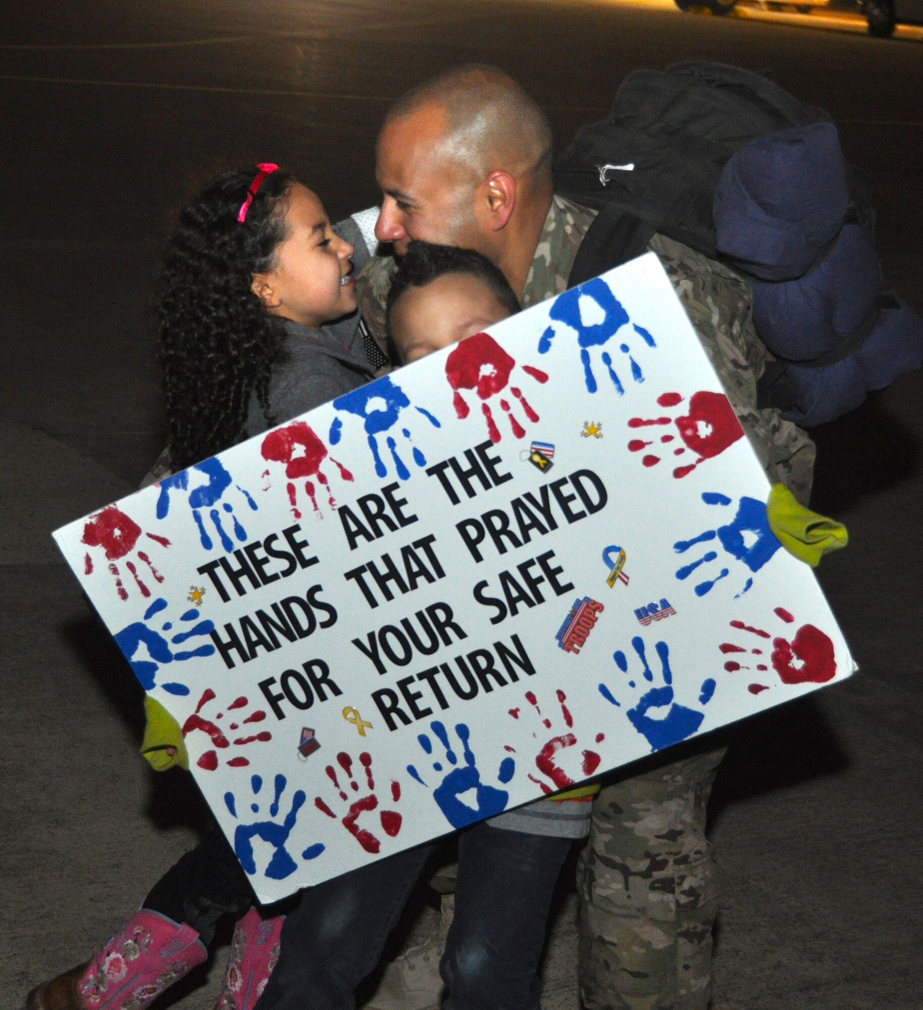 Reservists from the 301st Fighter Wing returned to chilly temperatures and a warm welcome home. Family members and friends displayed signs anticipating their loved-one's arrival from Afghanistan where they were deployed in support of Operation Enduring Freedom. (U.S. Air Force photo/MSgt Josh Woods)