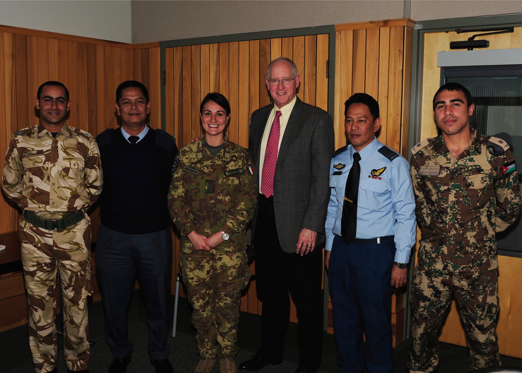 SAN ANGELO, Texas – Rep. Mike Conaway, 11th District of Texas, and International Military Student Officers pose for a group photo at the San Angelo Visitor Center Jan. 21. The meet and greet helped enhance relations between politicians and military service members, both foreign and domestic. (U.S. Air Force photo/ Airman 1st Class Devin Boyer)