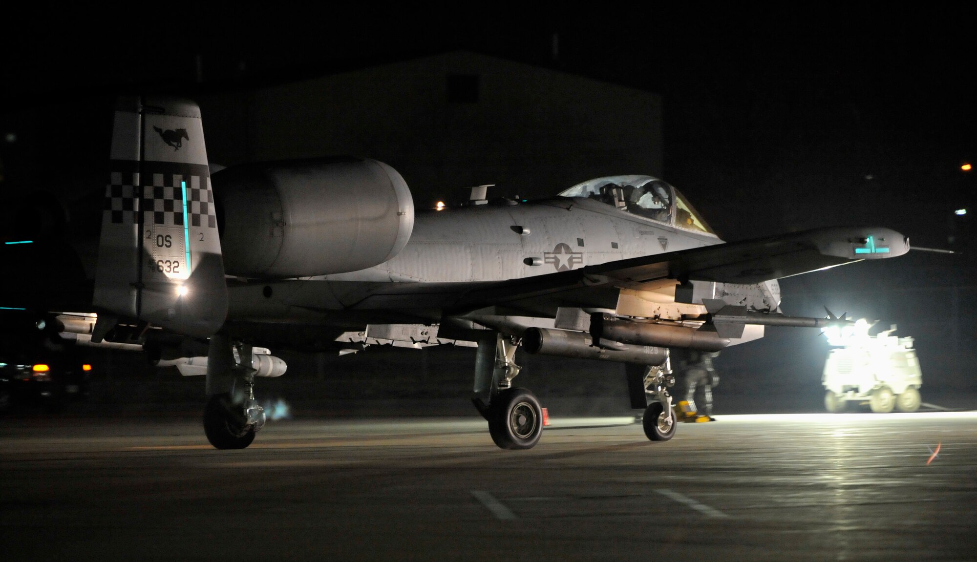 An A-10 Thunderbolt II from the 25th Fighter Squadron taxis down the runway during Beverly Midnight 14-02 at Osan Air Base, Republic of Korea, Feb. 10, 2014. Four A-10 pilots flew the first sortie of BM 14-02. (U.S. Air Force photo/Senior Airman Siuta B. Ika)