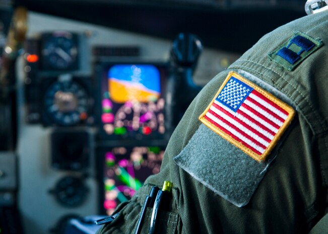 U.S. Air Force Capt. Tristen Wright, 92nd Air Refueling Squadron co-pilot, mans the controls of a KC-135 Stratotanker assigned to the 92nd Air Refueling Wing from Fairchild Air Force Base, Wash., during Red Flag 14-1 over the Nevada Test and Training Range Feb. 6, 2014. Red Flag is hosted at Nellis AFB, Nev., and gives Airmen the opportunity to experience realistic combat scenarios to prepare themselves for potential future conflicts or wars. (U.S. Air Force photo by Airman 1st Class Thomas Spangler)