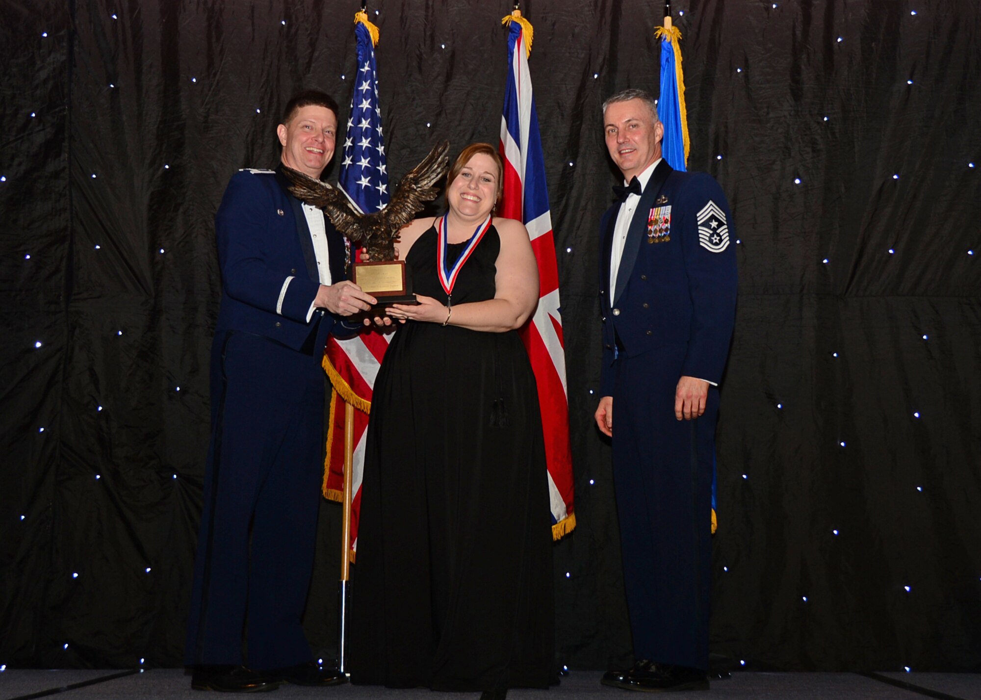 Katherine Moore, 48th Fighter Wing Airman and Family Readiness Center, was named Civilian Volunteer of the Year during the 2013 Annual Awards Banquet at Royal Air Force Lakenheath, England, Feb. 8, 2014. Airmen were recognized across 11 categories, representing the spectrum of the 48th Fighter Wing, during the ceremony. (U.S. Air Force photo by Airman 1st Class Erin O’Shea)