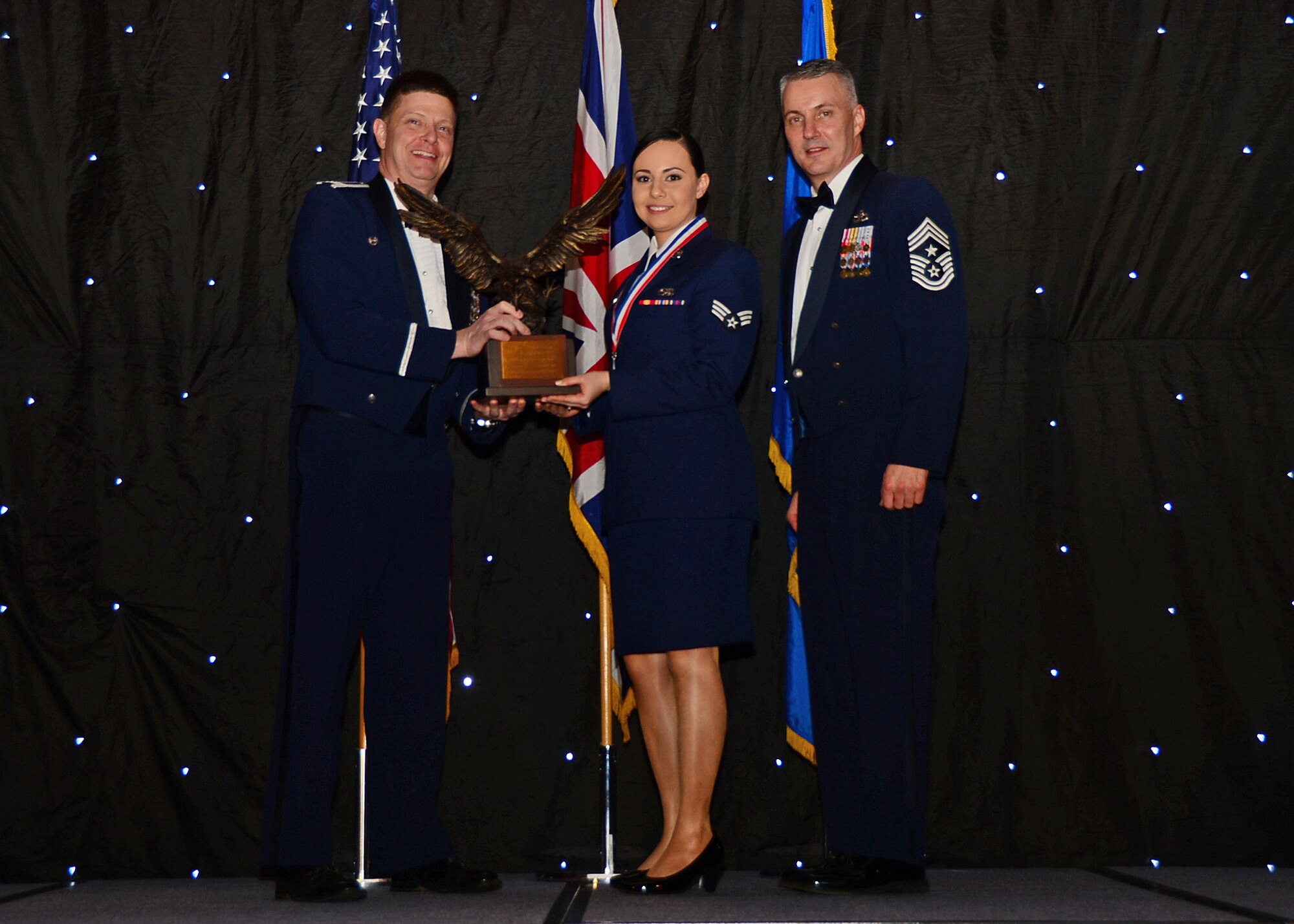 Senior Airman Erika Rodriguez, 48th Maintenance Group, was named Honor Guard Member of the Year during the 2013 Annual Awards Banquet at Royal Air Force Lakenheath, England, Feb. 8, 2014. Airmen were recognized across 11 categories, representing the spectrum of the 48th Fighter Wing, during the ceremony. (U.S. Air Force photo by Airman 1st Class Erin O’Shea)