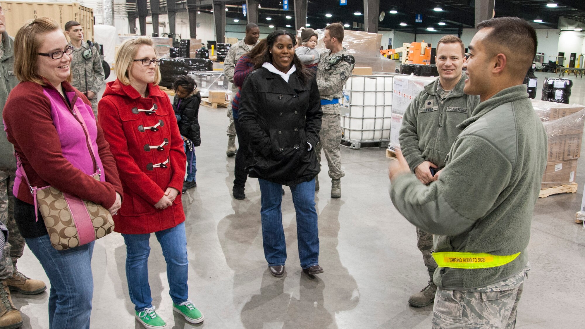 Spouses tour the 436th Aircraft Maintenance Squadron Feb. 6, 2014, on Dover Air Force Base, Del. The tour was informed the spouses on what their husbands and wives do on a day-to-day basis. (U.S. Air Force photo/ Senior Airman Jared Duhon) 
