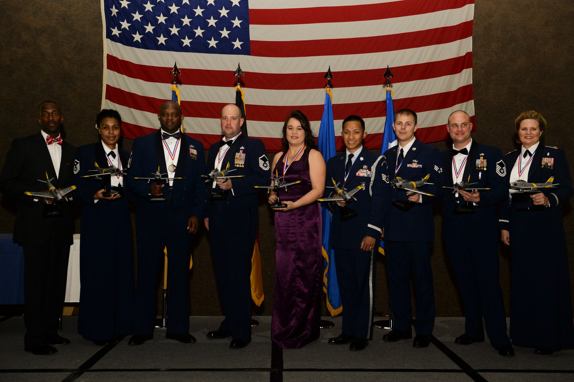 Annual Award winners pose for a photo following the Annual Awards Banquet, Feb. 8, 2014, at Spangdahlem Air Base, Germany. The event recognized Airmen for their outstanding achievements throughout the year. (U.S. Air Force photo by Senior Airman Rusty Frank/Released)