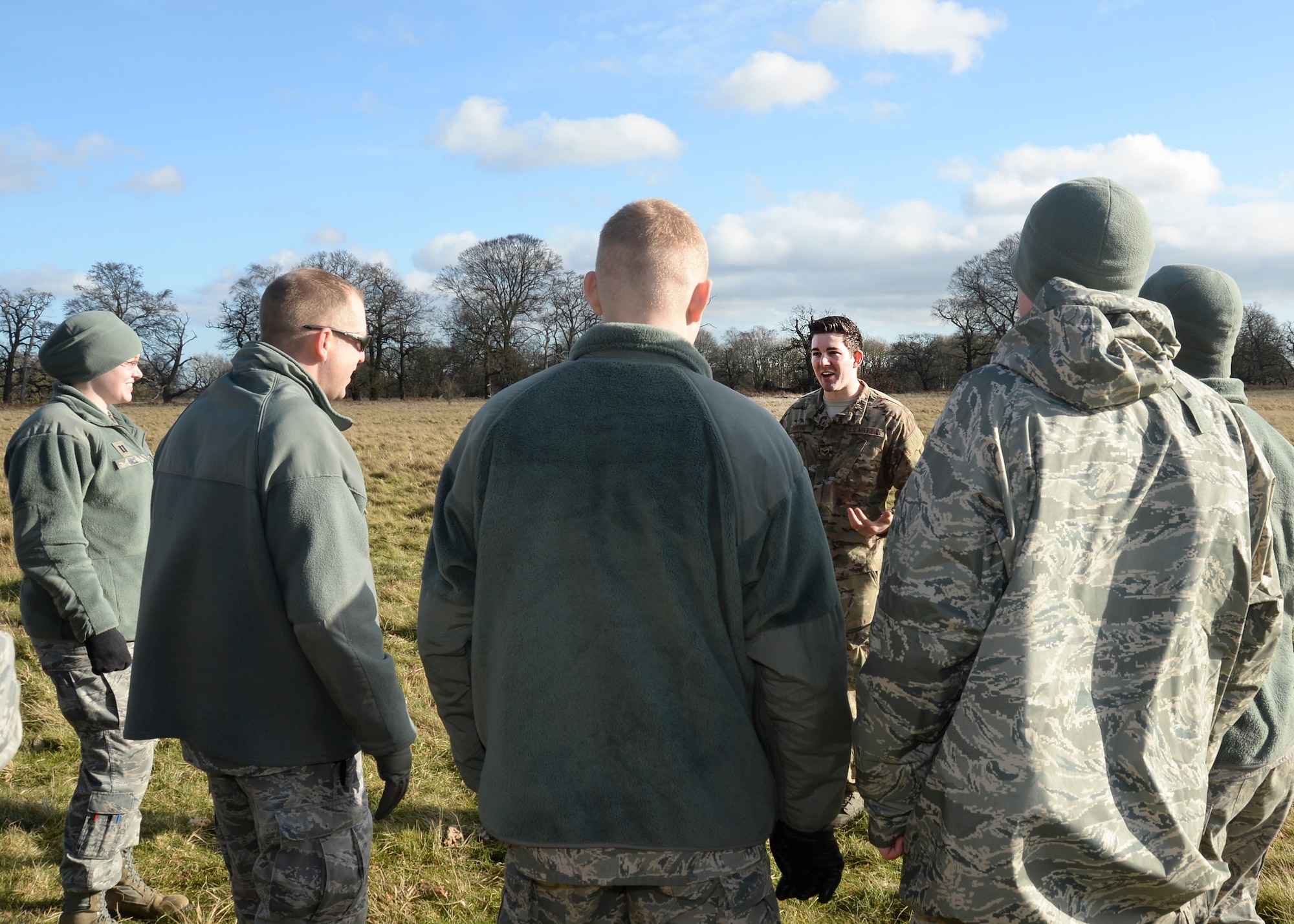 Senior Airman Kyle Hicks, 56th Rescue Squadron independent duty medical technician, briefs Airmen who will play mock victims at the Stanford Training Area, England, Feb. 6, 2014. Airmen participated in four days of training exercises in support of the Air Force’s combat search and rescue mission.  (U.S. Air Force photo by Airman 1st Class Nigel Sandridge/Released)