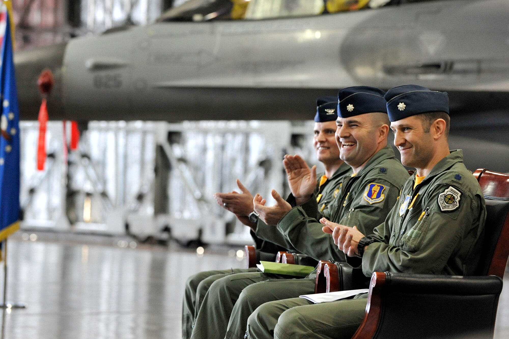 MISAWA AIR BASE, Japan -- Col. John Parker, 35th Operations Group commander and Lt. Cols. Gene Sherer and Jeff Cohen, share a moment during the squadron’s change of command ceremony at Misawa Air Base, Japan, Feb. 7, 2014. Cohen assumed command of the 14 FS from Sherer. (U.S. Air Force photo/Staff Sgt. Tong Duong.)