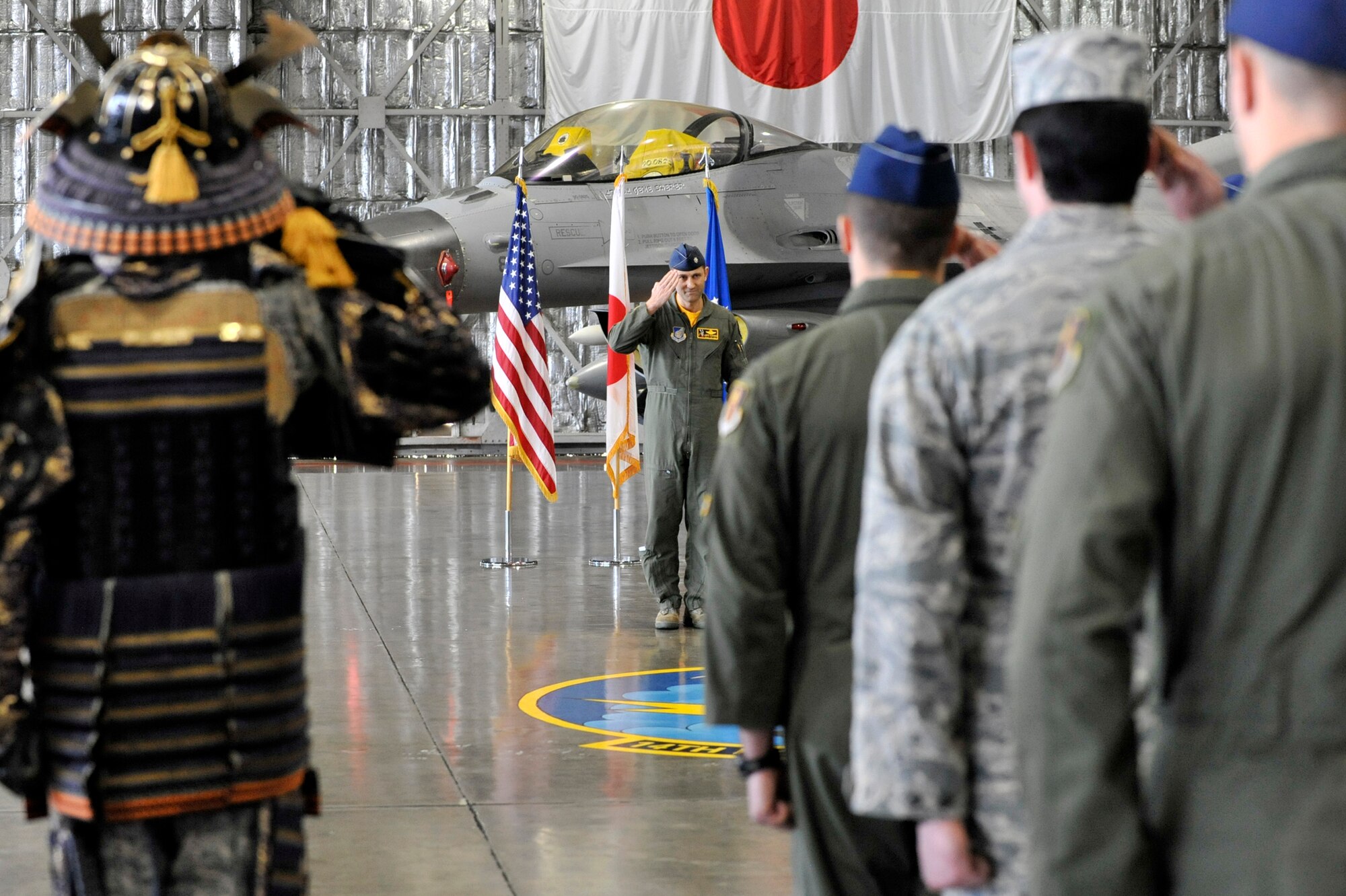 MISAWA AIR BASE, Japan -- Lt. Col. Jeff Cohen, 14th Fighter Squadron commander, receives the first salute from his Airmen during the squadron’s change of command ceremony at Misawa Air Base, Japan, Feb. 7, 2014. Cohen was the 13 FS director of operations before assuming command of the 14 FS. (U.S. Air Force photo/Staff Sgt. Tong Duong.)