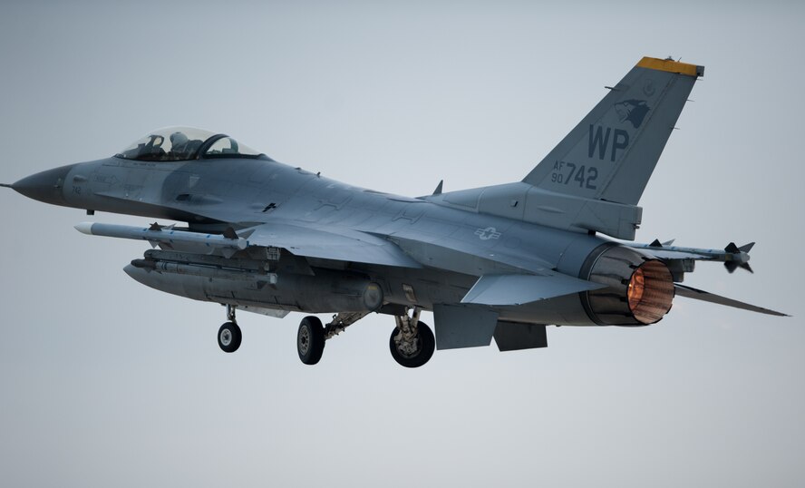An 80th Fighter Squadron F-16 Fighting Falcon takes off for a sortie during Beverly Midnight 14-01 at Kunsan Air Base, Republic of Korea, Feb. 7, 2014. BM 14-01 tested the Wolf Pack’s ability to react to a surprise attack and continue launching aircraft. (U.S. Air Force photos by Senior Airman Armando A. Schwier-Morales/Released)