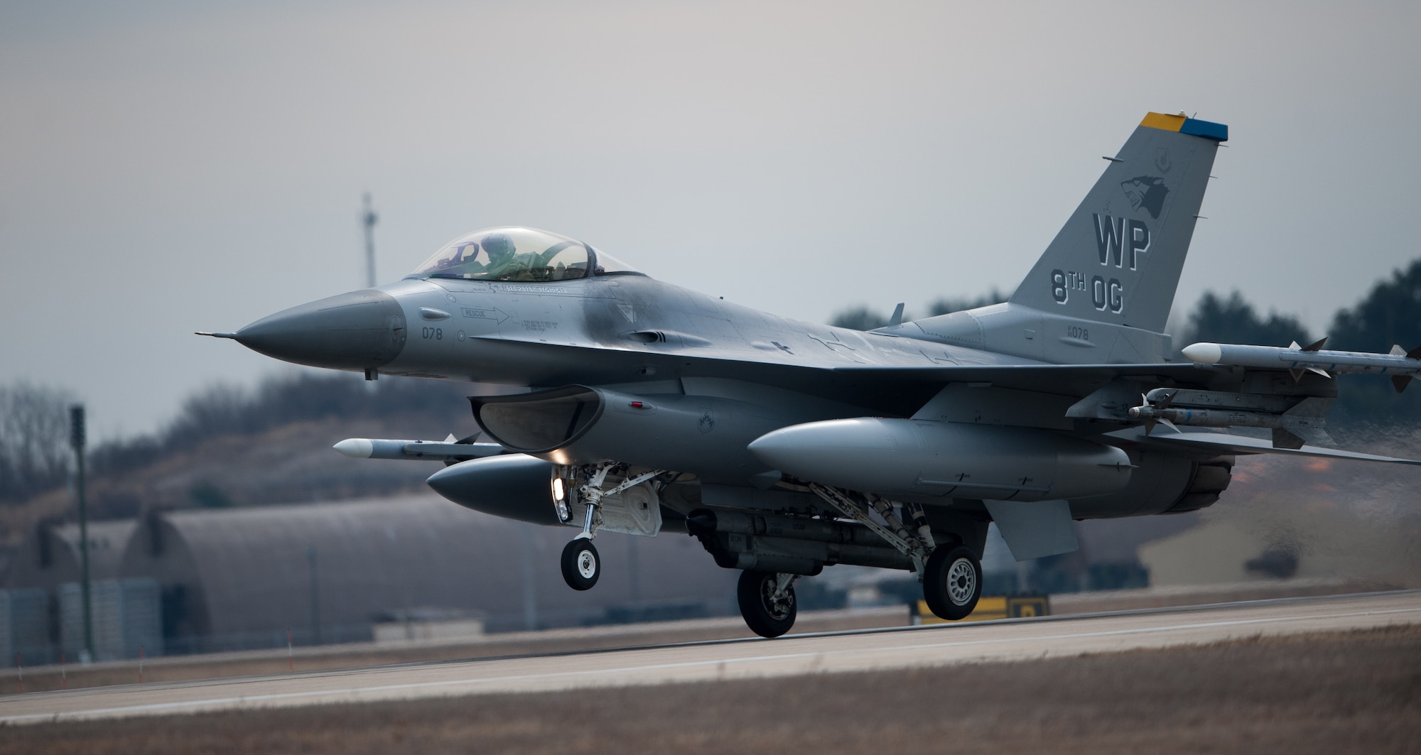 An 8th Operations Group F-16 Fighting Falcon takes off for a sortie during Beverly Midnight 14-01 at Kunsan Air Base, Republic of Korea, Feb. 7, 2014. BM 14-01 tested the Wolf Pack’s ability to react to a surprise attack and continue launching aircraft. (U.S. Air Force photos by Senior Airman Armando A. Schwier-Morales/Released)