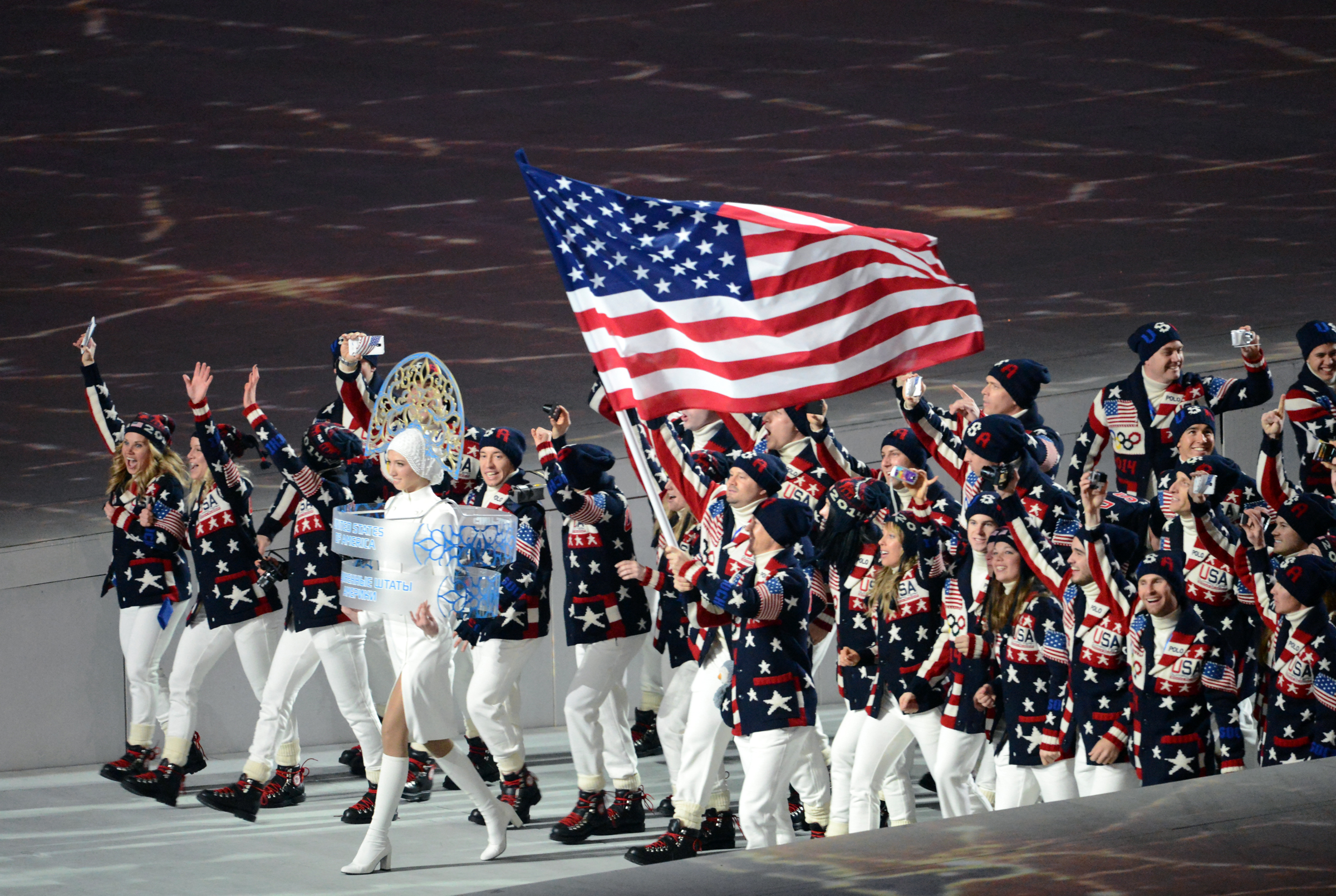 Todd Lodwick Carries The U S Flag Which Flies Over The Head Of