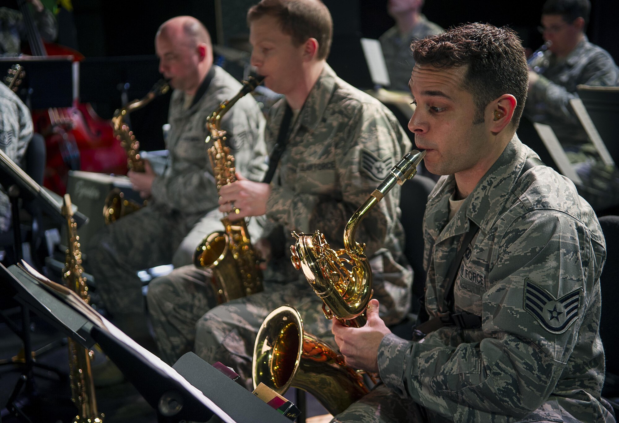 Staff Sgt. Lencys Esteban-Nunez plays saxophone during a rehearsal with The Ambassadors, the U.S. Air Forces in Europe Band jazz ensemble, Jan. 16, 2014, at Ramstein Air Base, Germany. Esteban-Nunez learned to play saxophone during his childhood in Republic of Cuba before immigrating to the United States and joining the Air Force. (U.S. Air Force photo/Tech. Sgt. Benjamin Wilson)