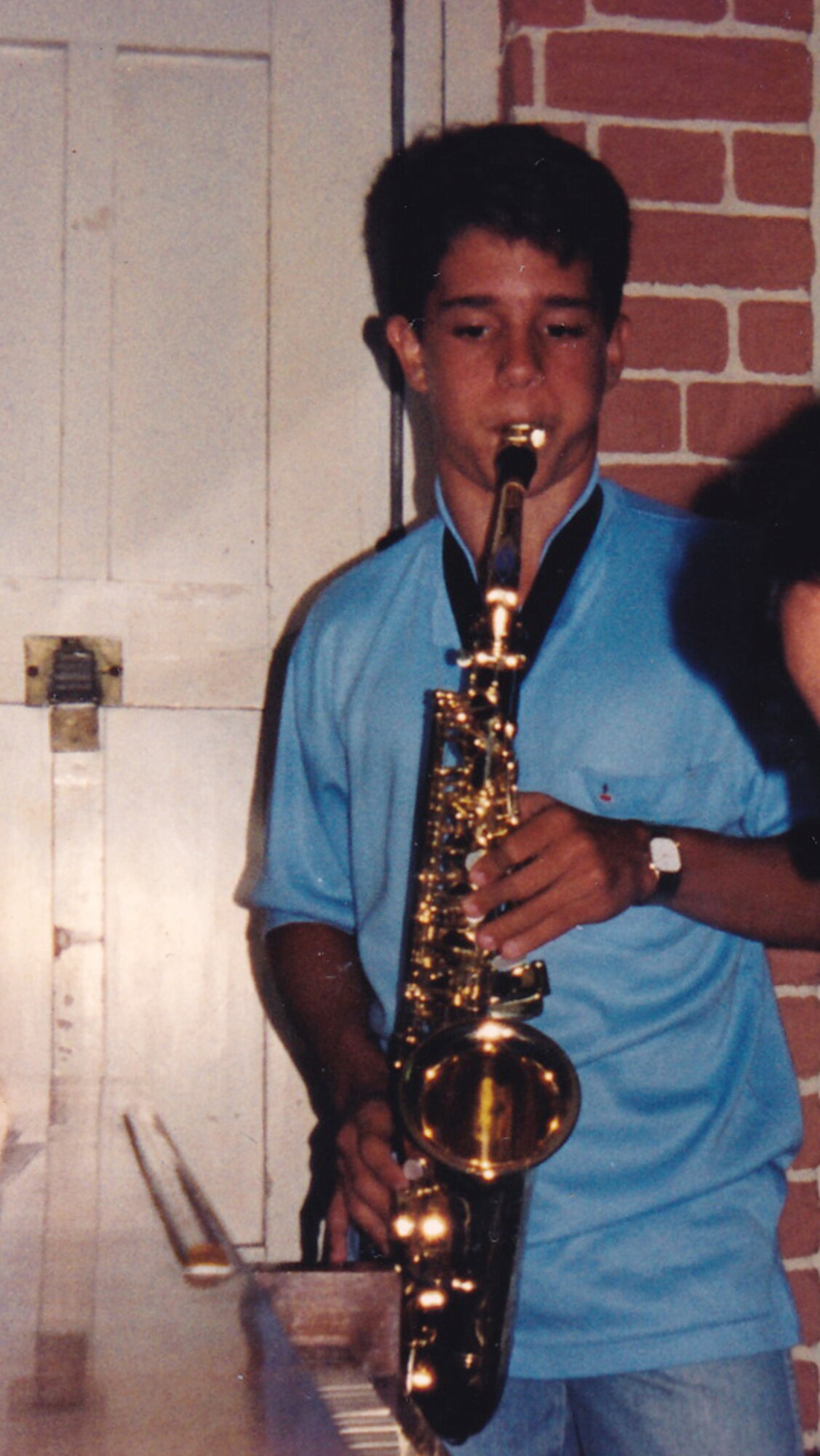 Now Staff Sgt. Lencys Esteban-Nunez plays saxophone in the Republic of Cuba. Esteban-Nunez learned to play saxophone during his childhood in Cuba before immigrating to the United States and joining the Air Force. (Courtesy photo) 