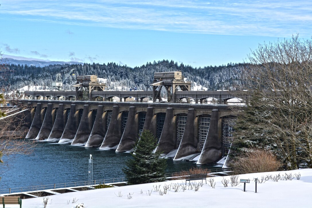 Winter snowfall at Bonneville Lock and Dam's First Powerhouse and spillway on Feb. 7, 2014.